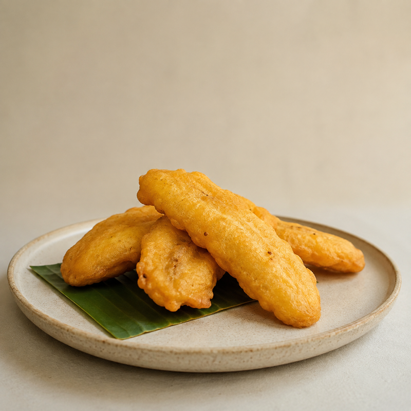 Pazham pori frying in coconut oil