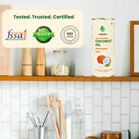 Naturish Elite cold pressed coconut oil steel tin displayed on a kitchen shelf with FSSAI, HACCP and ISO 22000 certification badges and the text ‘Tested. Trusted. Certified.